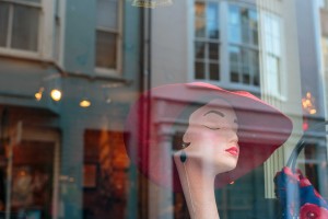 English seaside: Hat and mannequin in shop window in the Old Town at Hastings