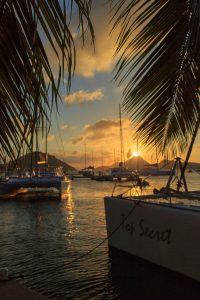Sunset at Sopers Hole, a popular yacht harbour and former pirate hang-out on Tortola, British Virgin Islands