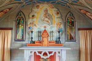 Interior and altar of The Italian Chapel. The chapel was built in a quonset hut by Italian prisoners of war held on Orkney during WWII