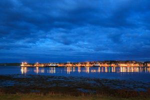 The harbour and ferry port at Kirkwall on a rainy summer night. Kirkwall is the largest town in Orkney