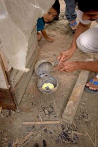 Sulfur fumes are used to give the straw its delicate antique ivory colour. Cheaper hats are simply bleached but the traditional hat makers of Montecristi use the old ways - putting the straw in a wooden smoker with burning sulphur