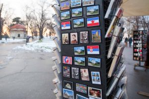 Nikola Tesla's face on a fridge magnet gazes at passers-by from a souvenir kiosk in Kalemegdan park