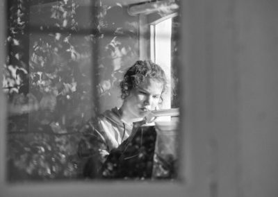 Thoughtful Girl in window